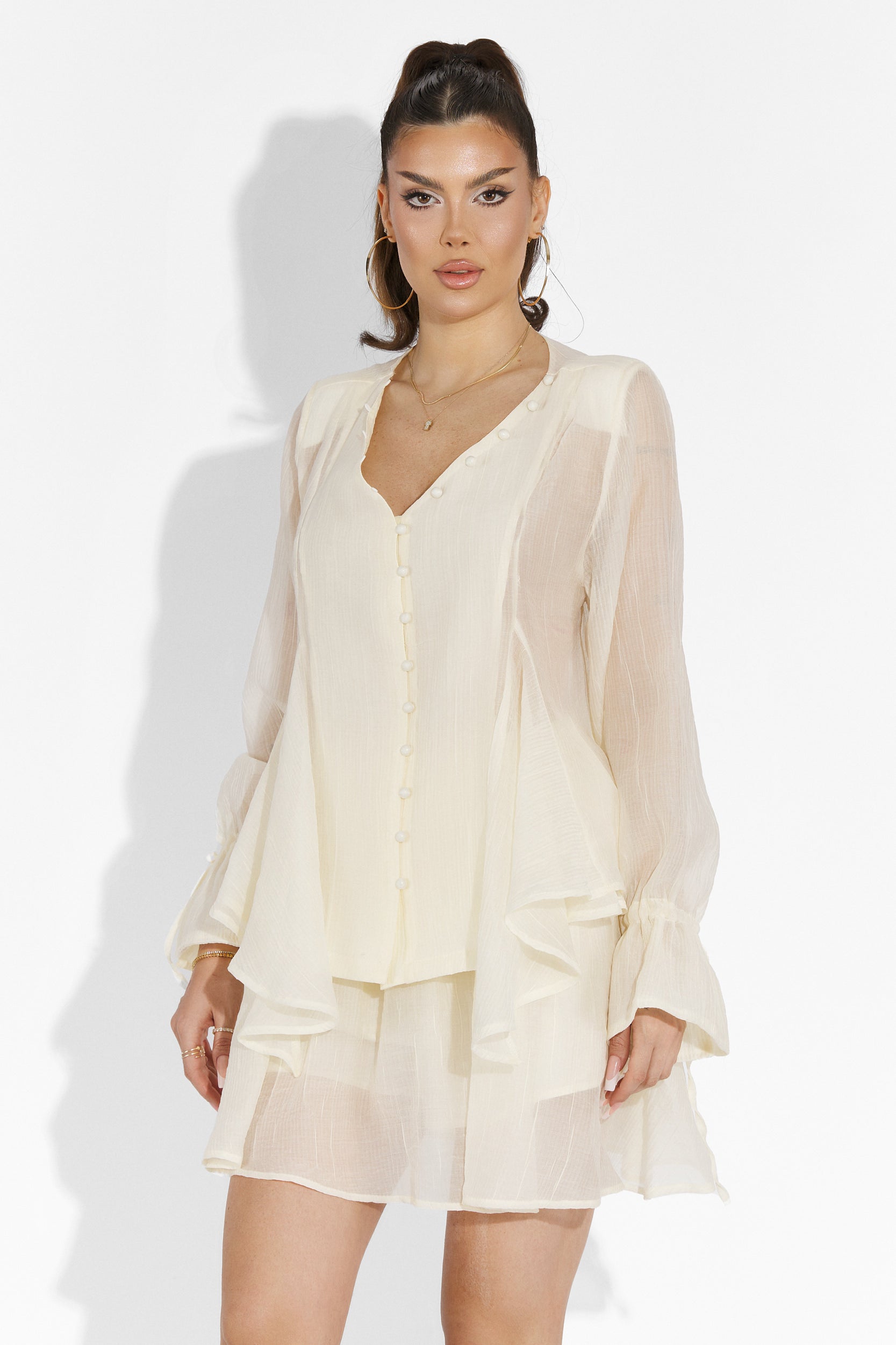Beige Sabryna Bogas pantsuit with skirt