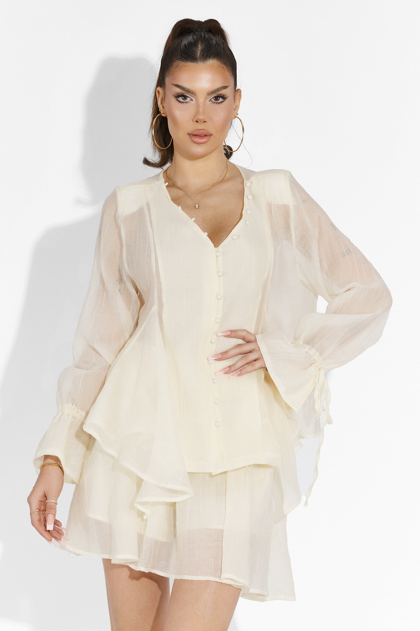 Beige Sabryna Bogas pantsuit with skirt
