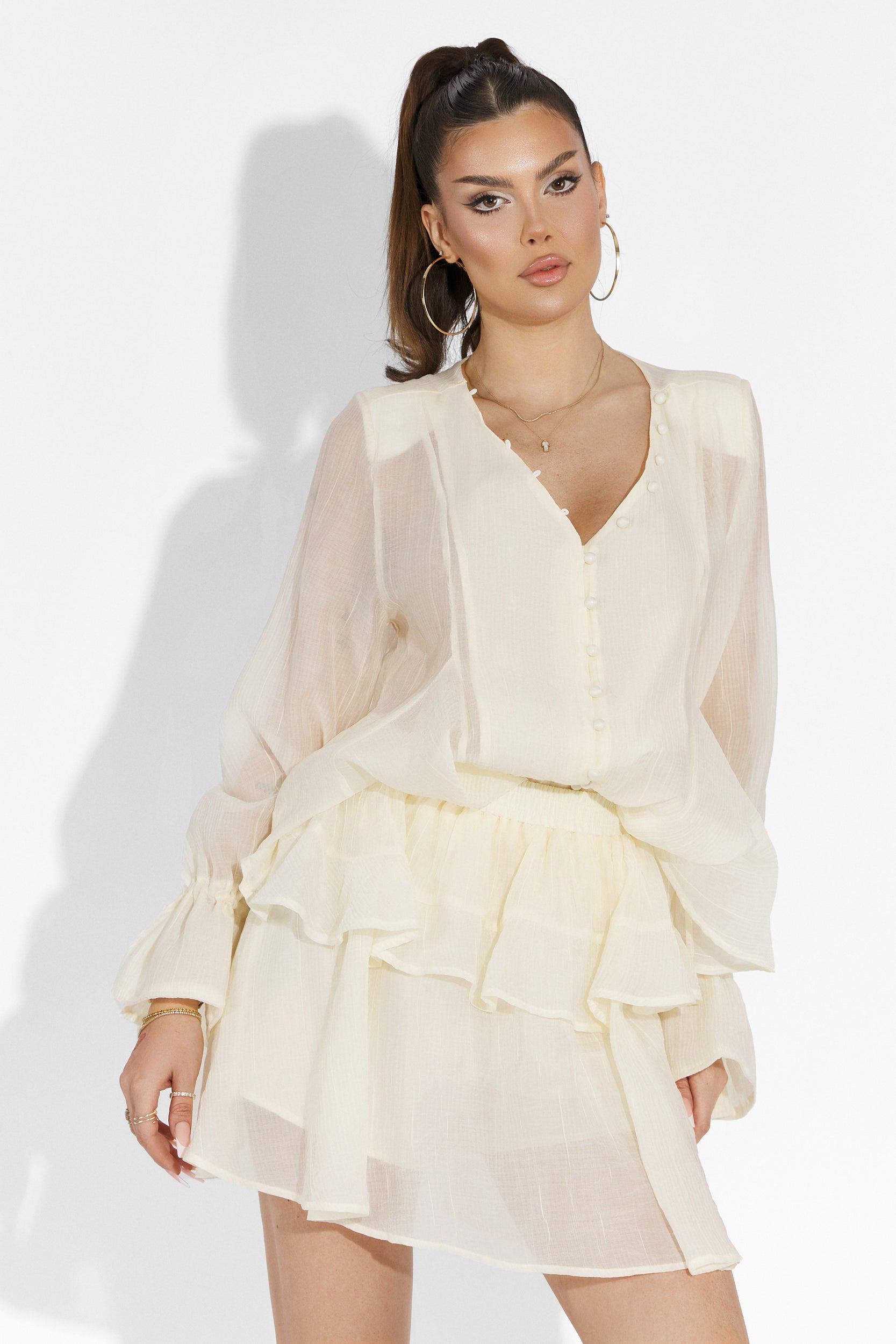 Beige Sabryna Bogas pantsuit with skirt