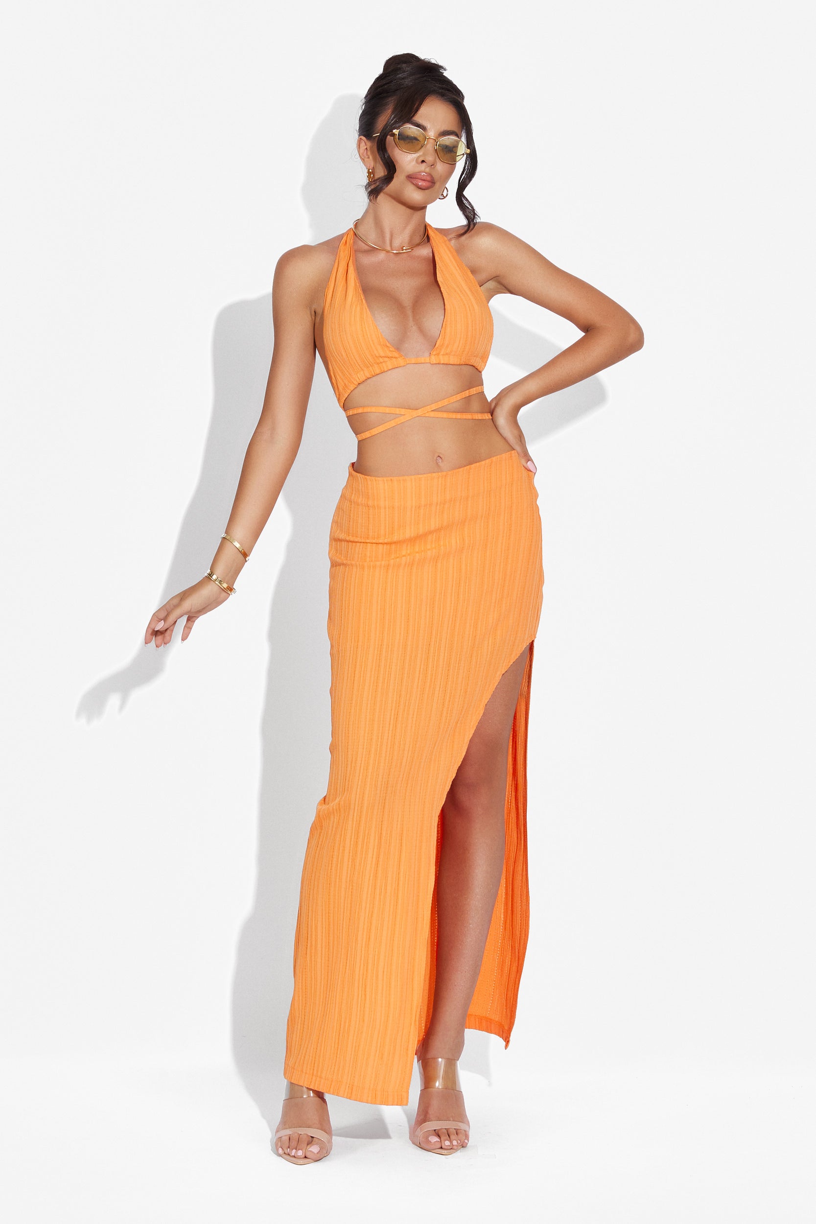 Complete with Cristala Bogas orange skirt