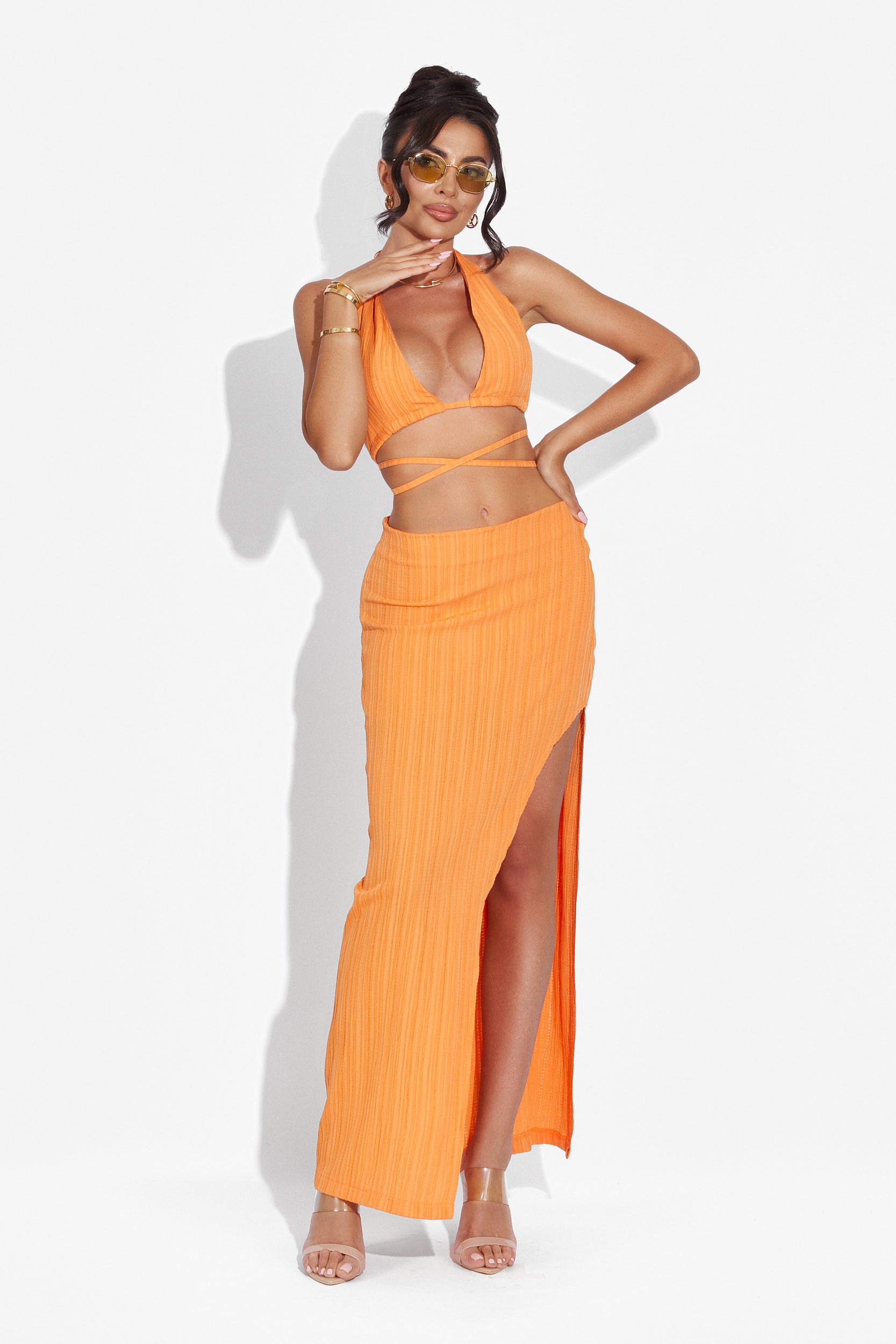 Complete with Cristala Bogas orange skirt