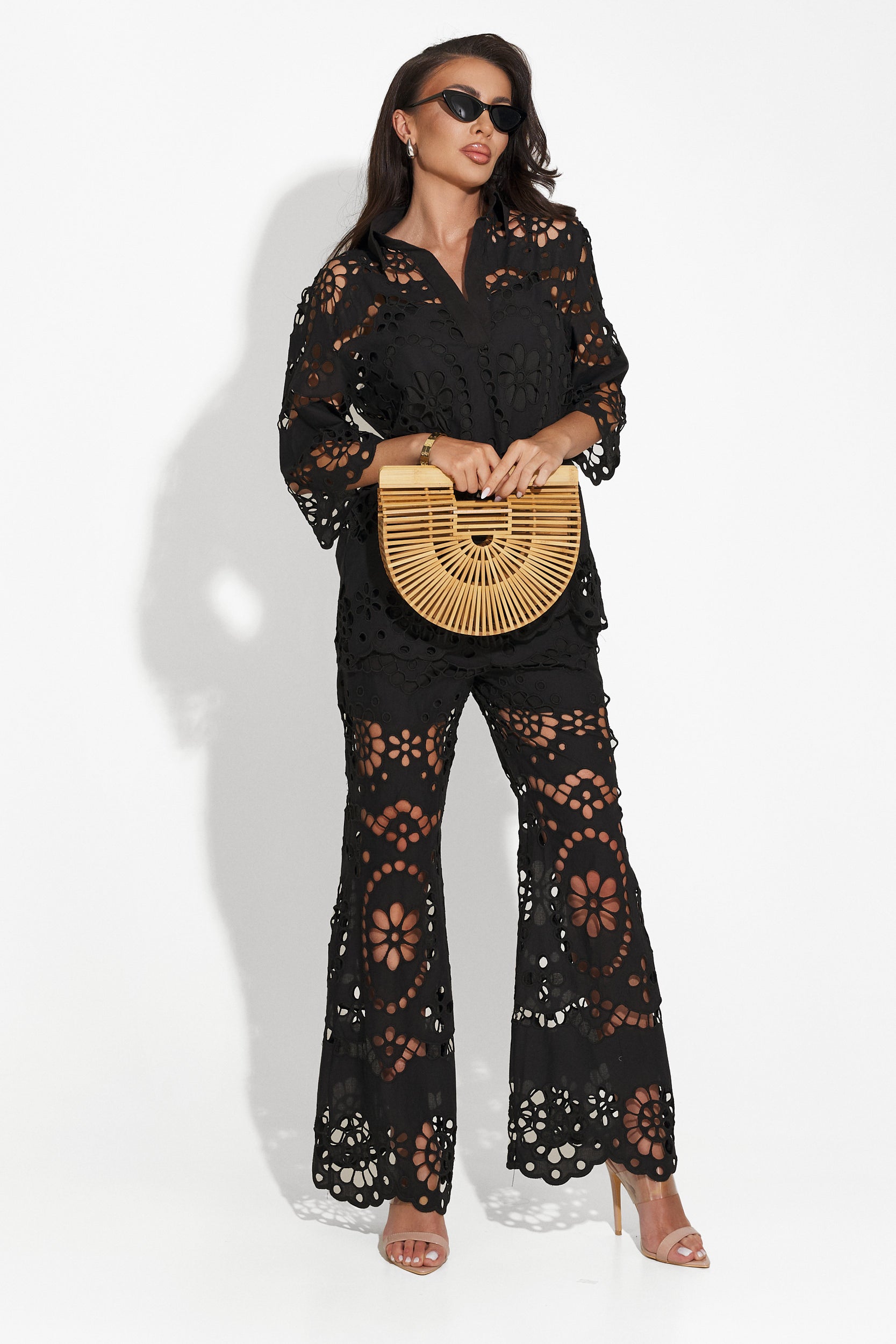 Yustina Bogas elegant black women's suit